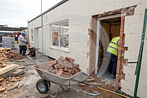 Breaking wall for building entrance during renovation