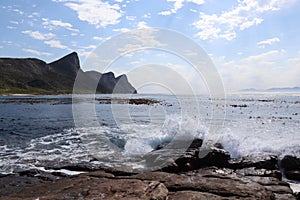 A breaking wave at Cape Point National Park in Cape Town, South Africa