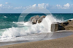 Breaking waves at beach of Sicily,