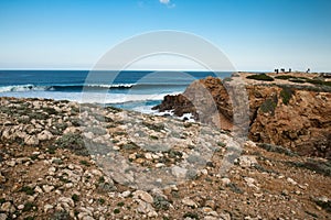 Breaking waves by cliffs of atlantic coastline