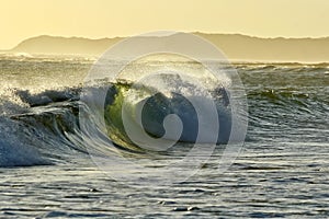 Breaking waves in the late afternoon sun