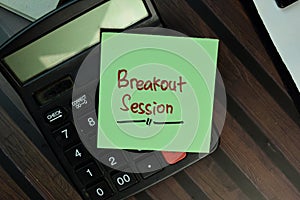 Breakout Session write on sticky notes isolated on Wooden Table