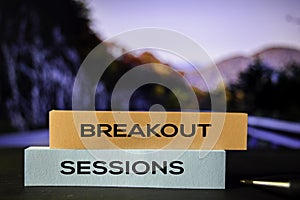 Breakout Sessions on the sticky notes with bokeh background photo