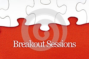 BREAKOUT SESSIONS text with jigsaw puzzle on red background.