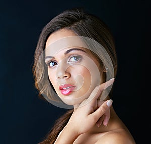 Because breakouts happen to the best of us. Portrait of a beautiful young woman posing against a dark background1u.