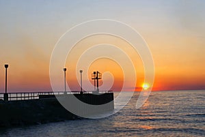 Breakwall at Sunset photo