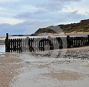 Breakwater and Cliffs, Overstrand, Cromer, Norfolk, UK