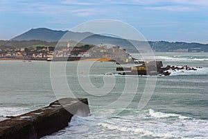 Breakwater of the harbor of Saint-Jean-de-Luz, France photo