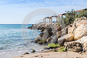 Breakwater overlooking the sea with a promenade terrace on the waterfront of Nahariya city in Israel