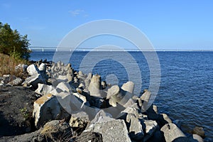 Breakwaters on the bank of Volga river. Summer scene