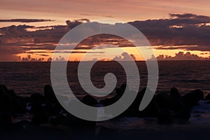 breakwater cloudy sunset photo