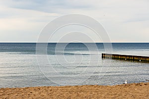 Breakwaters at sea during a calm day