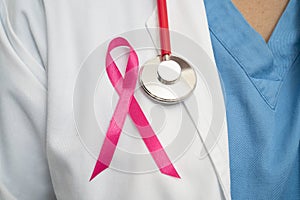 Breast cancer, Asian doctor woman with pink ribbon, symbol of World Breast Cancer Day