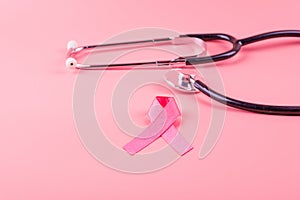 Breast Cancer Awareness, Pink Ribbon with Stethoscope for supporting people living and illness. Woman Healthcare and World cancer