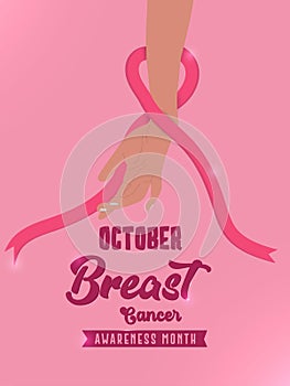 Breast cancer awareness and prevention concept. Female hands holding pink ribbon support and fight cancer.