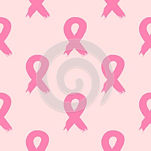 Breast cancer awareness ribbon. A seamless pattern painted with a rough brush.