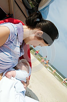 Breast feeding on the beach