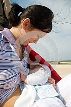 Breast feeding on the beach