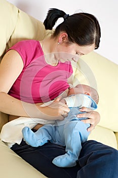 Breast feeding on sofa