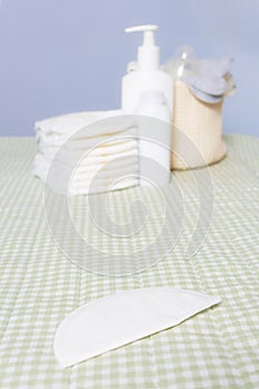 Breast pads. Newborn care supplies. Changing table