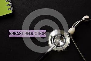 Breast Reduction on top view black table and Healthcare/medical concept