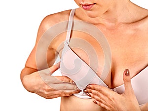 Breast self exam.