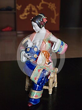 Breastfeeding Chinese Porcelain Statue