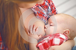 Breastfeeding. mother breast feeding baby photo