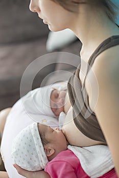 Breastfeeding twin babies photo