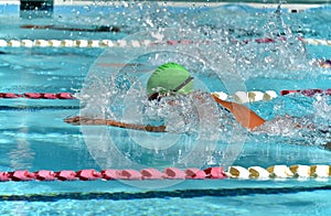 Breaststroke swimmer at a swim meet