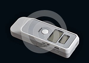 Breath alcohol tester isolated on black closeup