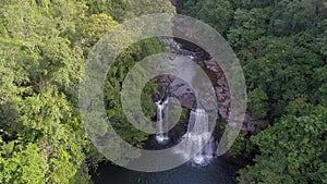A Breathtaking Aerial Perspective of Rainforest Waterfalls