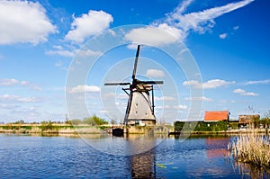 Breathtaking beautiful inspirational landscape with windmills in Kinderdijk, Netherlands. Fascinating places, tourist attraction