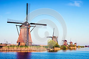 Breathtaking beautiful inspirational landscape with windmills in Kinderdijk, Netherlands. Fascinating places, tourist attraction