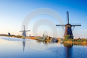 Breathtaking beautiful inspirational landscape with windmills in Kinderdijk, Netherlands. Fascinating places, tourist attraction