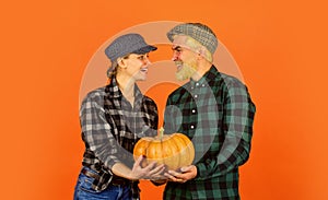 Breathtaking feelings. happy family of farmers. man and woman retro peaked hat. vintage couple hold pumpkin and maple
