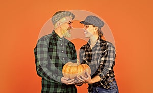 Breathtaking feelings. happy family of farmers. man and woman retro peaked hat. vintage couple hold pumpkin and maple