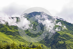 Breathtaking Green Landscape with Foggy Mountains and Waterfalls during Monsoon in Nepal