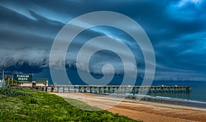 Breathtaking natural view of a storm shelf cloud over the Flagler Beach, Florida photo