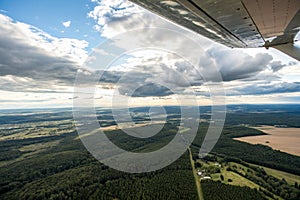 Skyline Horizon - Panoramic View from a Plane Window with Clouds and Fields