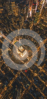 Breathtaking Portrait Aerial View of the Empire State Building at Night in Manhattan, New York City at Night