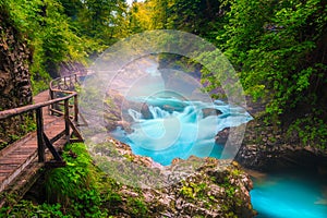 Breathtaking Radovna river in Vintgar gorge and wooden footbridge, Slovenia