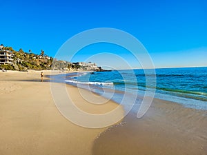 A breathtaking shot of the vast blue ocean water along the coastline with sandy beaches