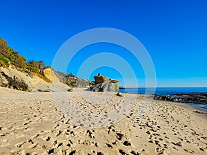 A breathtaking shot of the vast blue ocean water along the coastline with sandy beaches