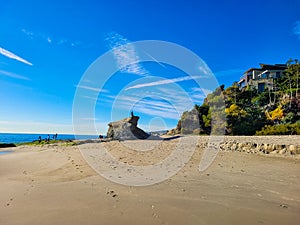 A breathtaking shot of the vast blue ocean water along the coastline with sandy beaches