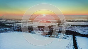 Breathtaking Siberian winter. Soft sunset, stark industrial silhouettes. Aerial Drone Shot.