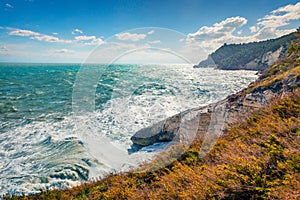 Breathtaking spring view of popular scenic spot Torre dell`Aglio, region, Italy, Europe. Stormy wether on Adriatic sea.