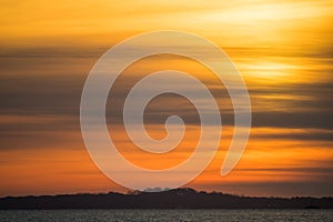 Breathtaking sunrise over the tranquil waters of Long Island Sound and Fishers Island, NY