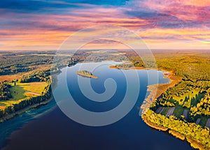 Breathtaking sunset on Krymne Lake. Picturesque view from flying drone of Shatsky National Park, Volyn region, Ukraine