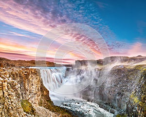 Breathtaking sunset view of the most powerful waterfall in Europe called Dettifoss